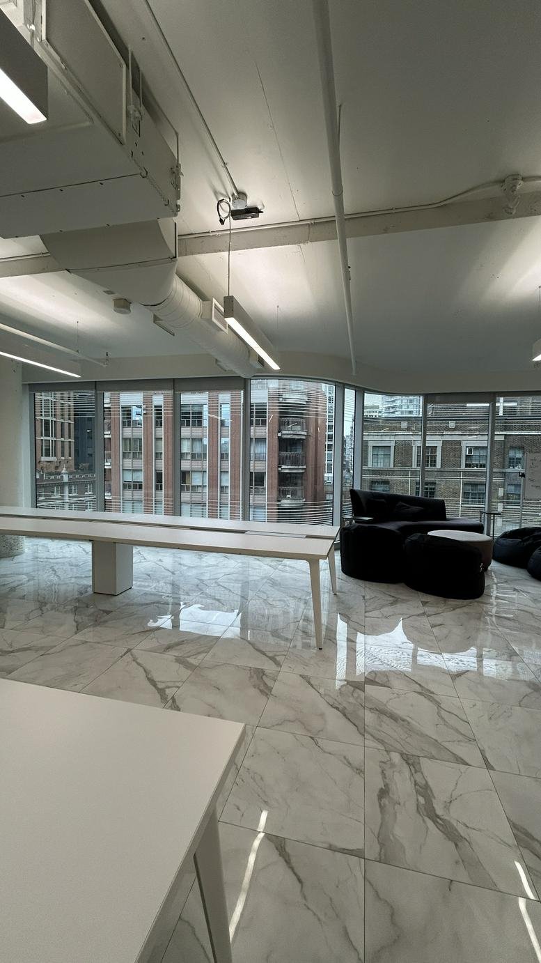 Spacious open-plan office at 7, Saint Thomas Street, 503 featuring marble floors and large windows.