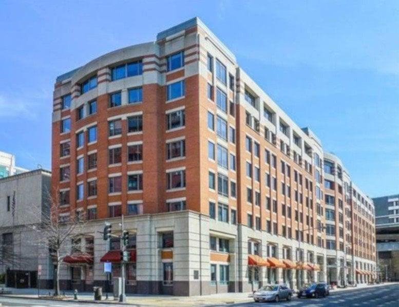 Exterior corner view of the brick and stone building at 10 G Street NE.