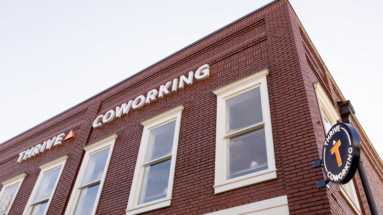 Exterior view of the brick facade at Thrive Coworking at 100 Main Street SW, Gainesville.