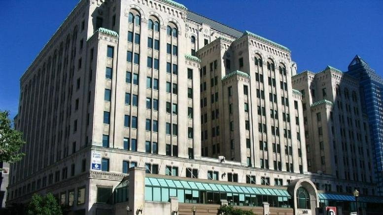 Historic stone exterior building facade at 1010 Rue Sainte-Catherine Ouest.