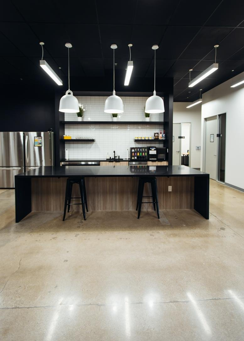 Modern communal kitchen and cafe area at 1801 Flower Avenue, Duarte, California.