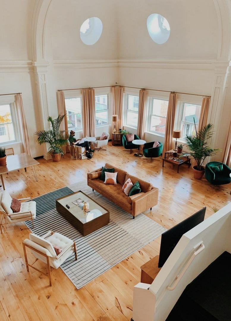 Spacious, high-ceilinged coworking lounge at 291 Wall Street, Stockade District, Kingston, New York.