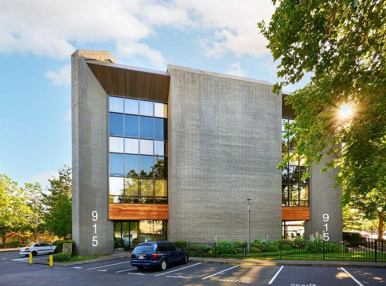 Exterior view of the concrete and glass facade of 915 Broadway Street, Esther Short.