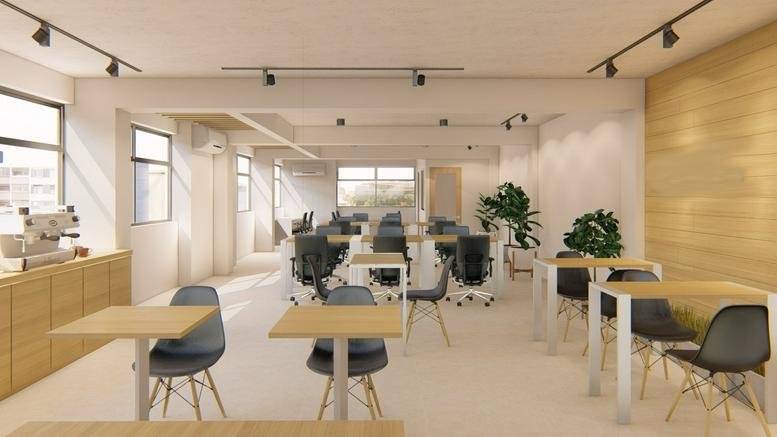 Spacious coworking area at Avenida 1era, Calle 21 n23, with wooden accents and indoor plants.