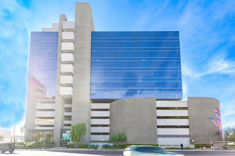 External view of the glass-facade mid-rise tower at 2828 North Central Avenue.