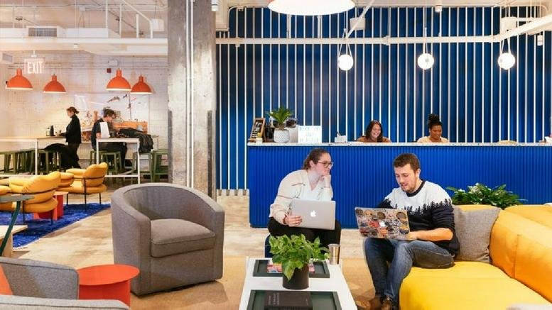 Spacious communal lounge and reception area at 609 Greenwich Street, New York City.