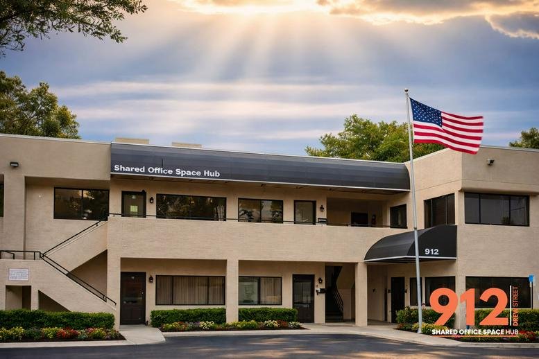 Exterior view of the Shared Office Space Hub building with an American flag out front.