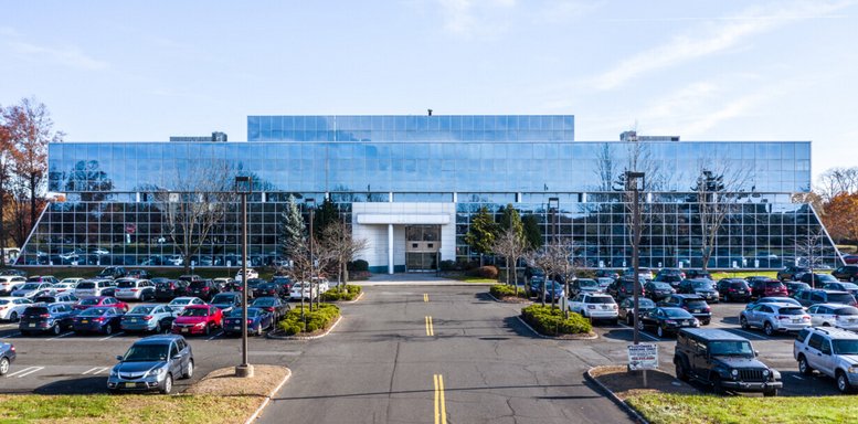 Wide exterior of the glass-fronted office building at Davidson Avenue, Franklin Township.