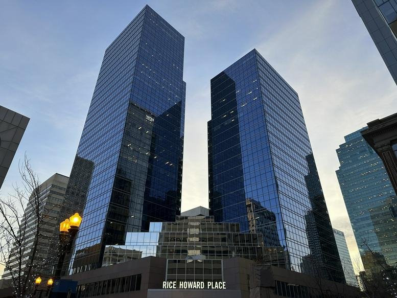 Exterior view of the glass-facade Rice Howard Place at 10060 Jasper Avenue.