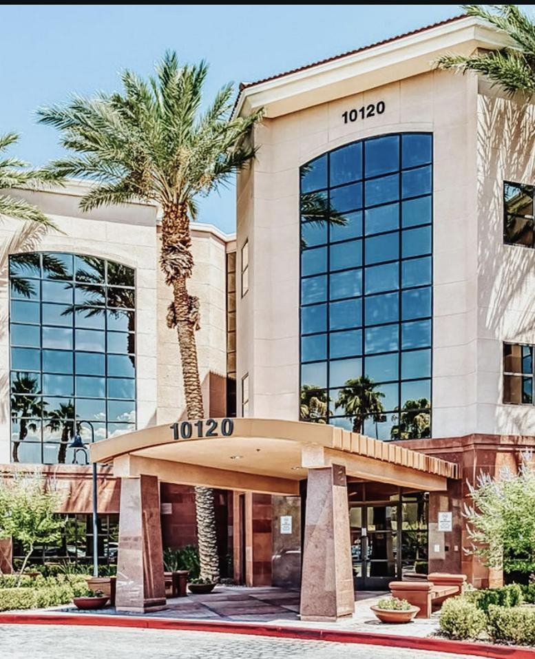 Exterior view of the multi-story office building at 10120 South Eastern Avenue.