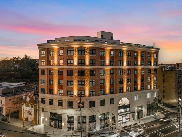 Exterior view of the multistory brick and stone building at 112 South Main Street, Port Chester.