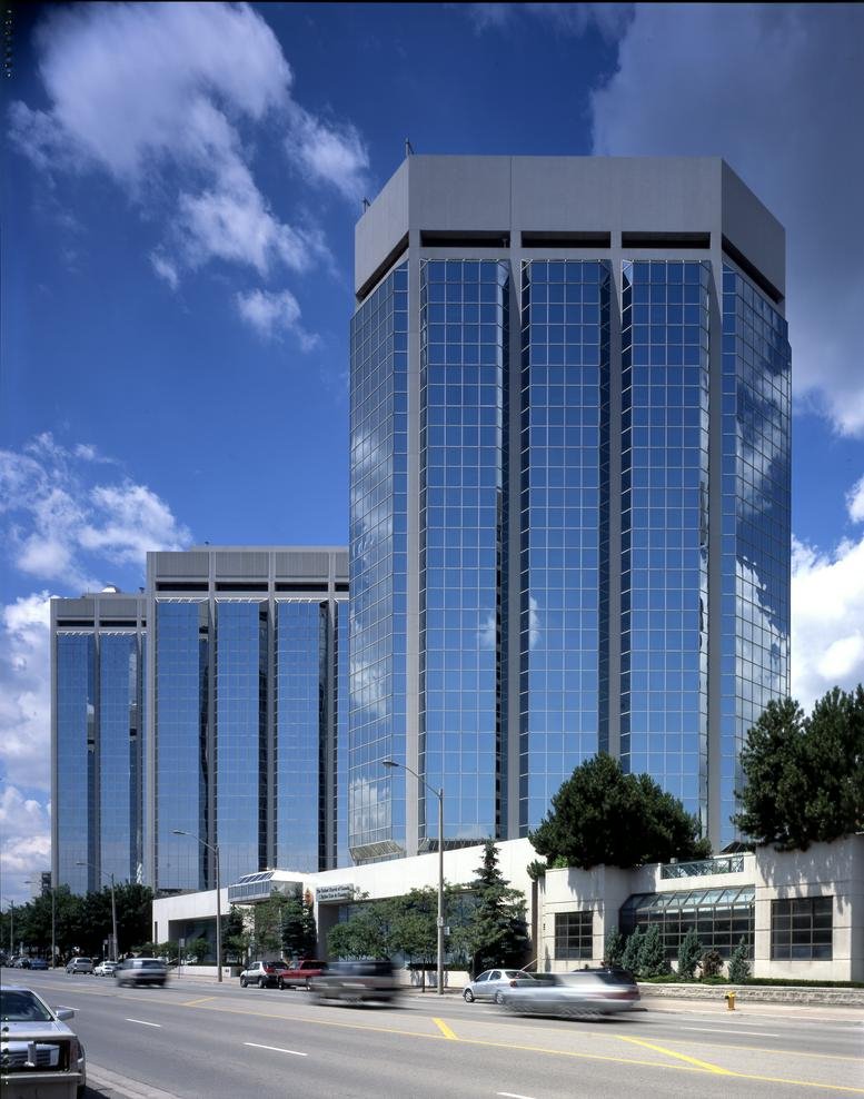 Exterior view of the glass-facade office towers at 1140-3280 Bloor Street West.