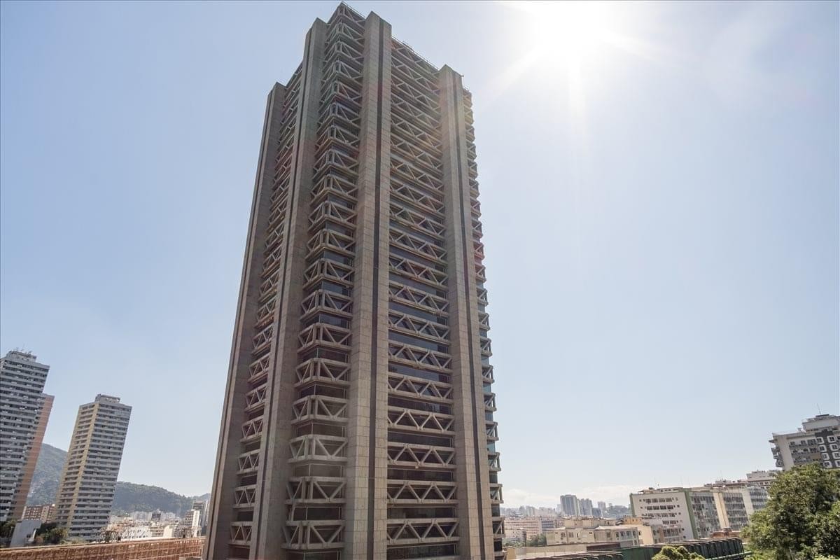 Exterior view of the tall concrete and glass facade of 116, Lauro Muller Str.