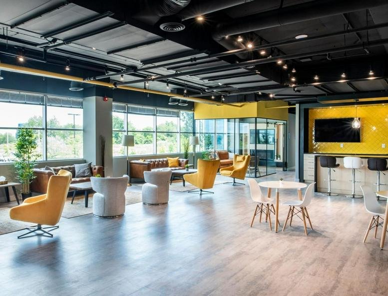 Exterior view of the modern glass building complex.