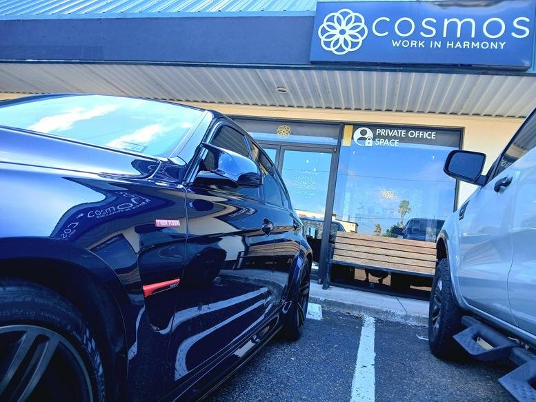 Exterior view of the storefront for Cosmos Work in Harmony at 1200 North 10th Street.
