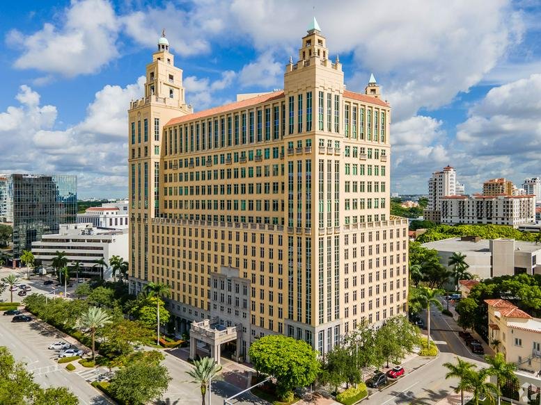 Exterior view of the historic Mediterranean-style tower at 121 Alhambra Plaza.