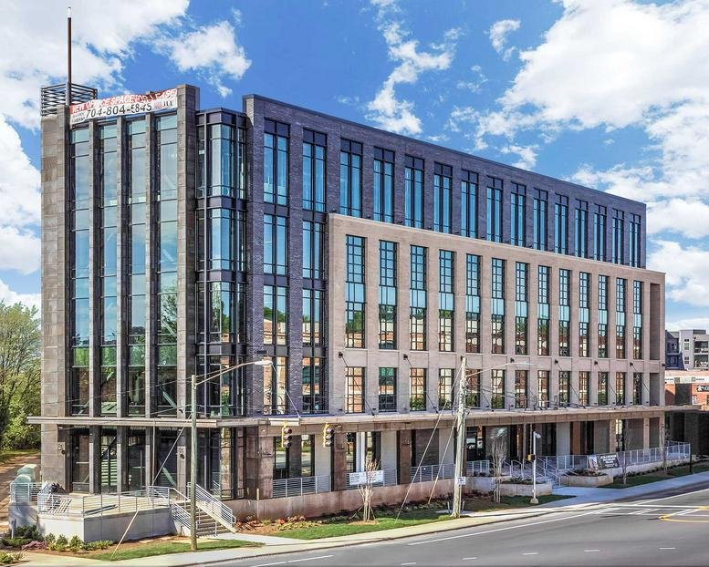 Modern multi-story exterior of the office building at 1213 West MoreHead St, Charlotte, NC.