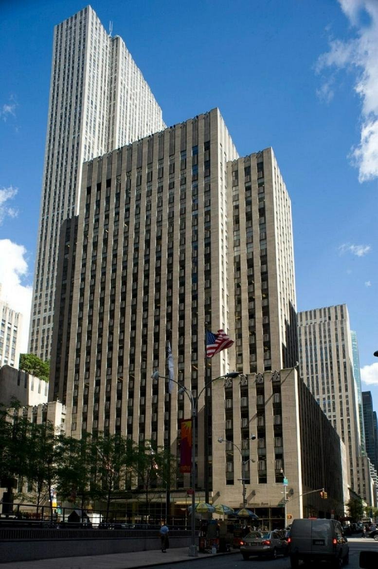 Exterior view of the limestone facade of 1230 Avenue of the Americas in Rock Center.