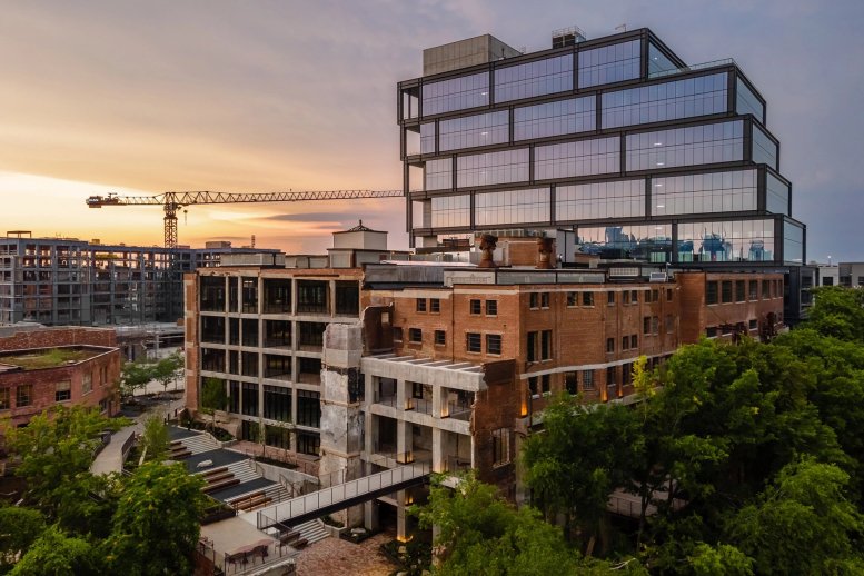 Modern multi-story office building at 1316 Adams Street with an industrial brick facade.