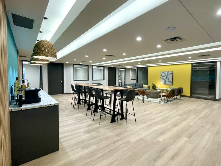 Spacious communal lounge and coworking area at 132 Trafalgar Road.