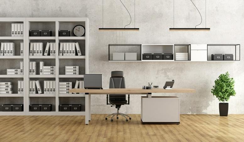 Wide-angle view of a modern office with a single desk and shelving.