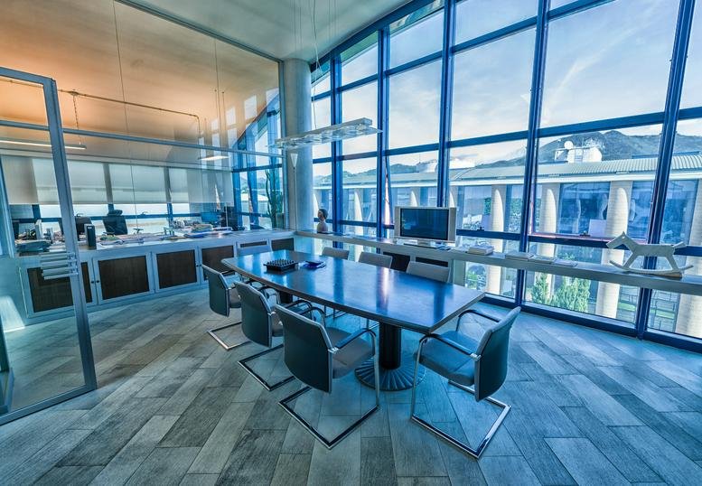 Modern conference room at 1401 Lawrence Street, 16th Floor, featuring floor-to-ceiling city views.