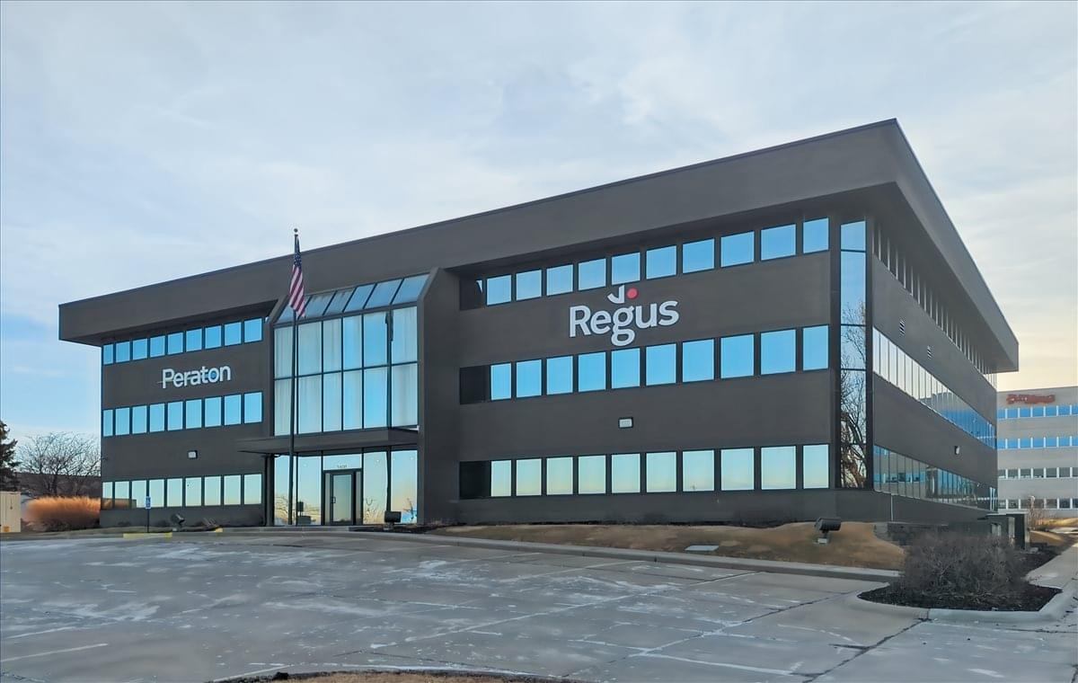 Exterior view of the dark brick facade at 1408 Fort Crook Road, 3rd Floor.