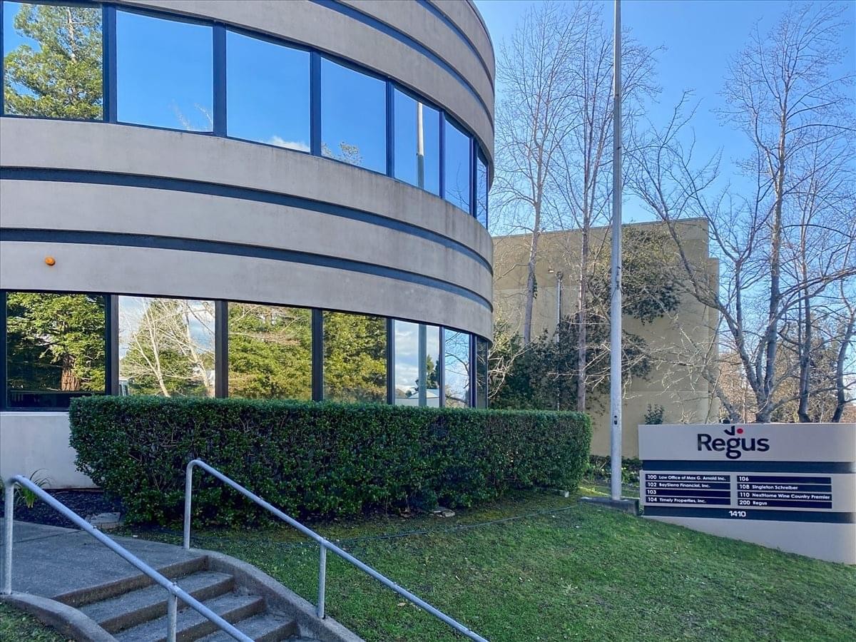 Exterior view of the modern curved building at 1410 Neotomas Avenue, 2nd Floor.
