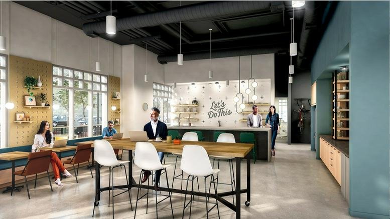 Spacious communal lounge and cafe area with high-top tables and a stylish service bar at 14301 Winter Breeze Drive.
