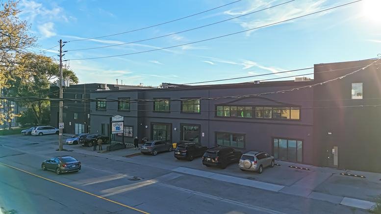 Exterior view of the grey brick building at 146 Thirtieth Street, Suite 100, Toronto, Ontario.