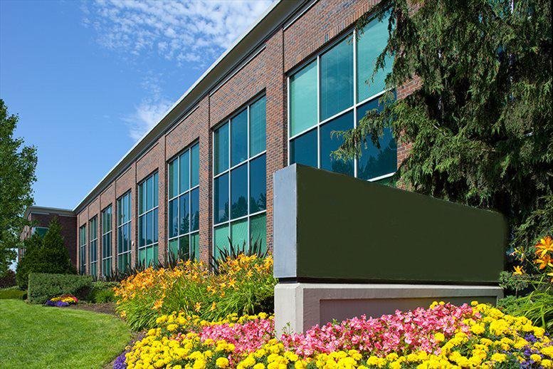 Brick and glass exterior of the office building at 14900 Interurban Avenue South.