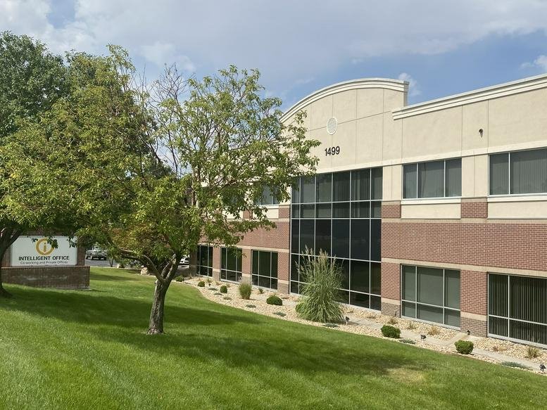 Exterior view of the brick and glass facade at 1499 West 120th Avenue.