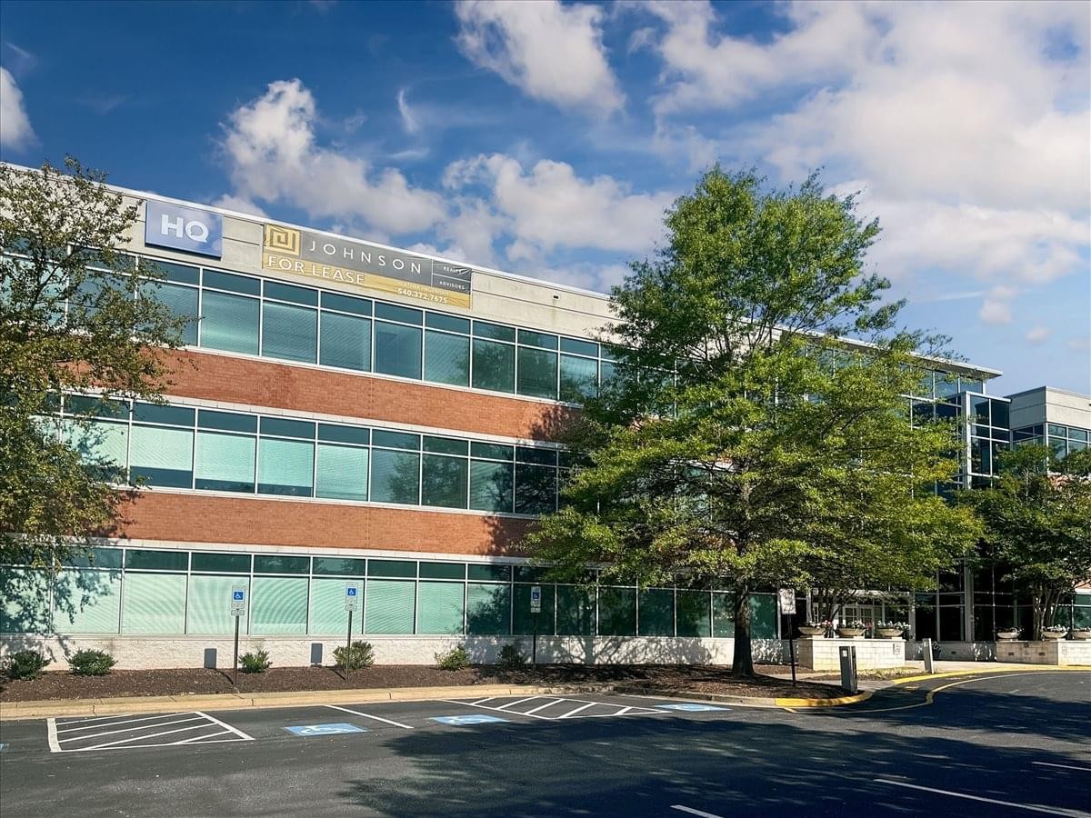 Exterior view of the brick and glass building at 150 Riverside Parkway.