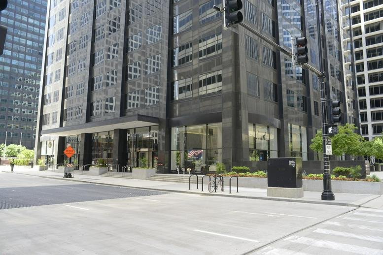 Exterior facade and street entrance of 150 South Wacker, Chicago, Illinois.