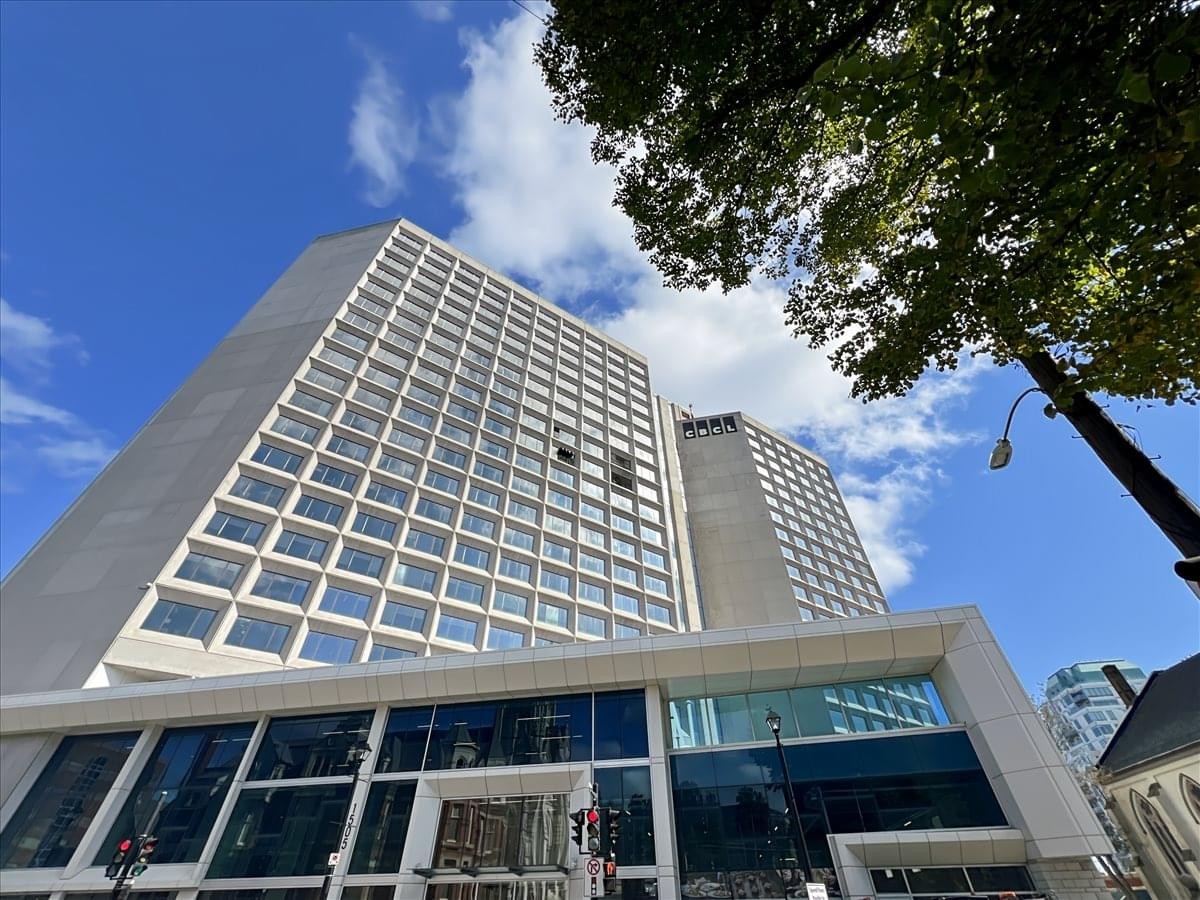 Exterior view of the building facade showing modern glass and concrete construction.