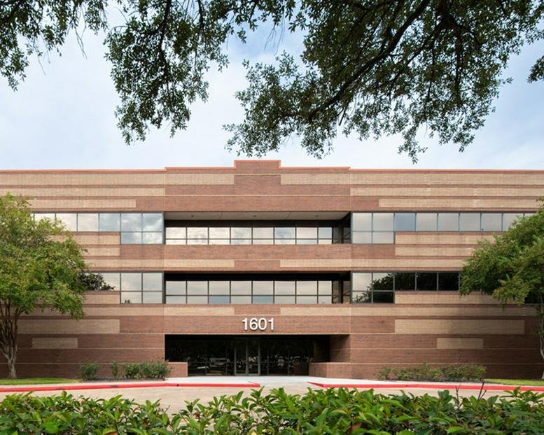 Exterior view of the multi-toned brick facade at 1601 Industrial Boulevard.