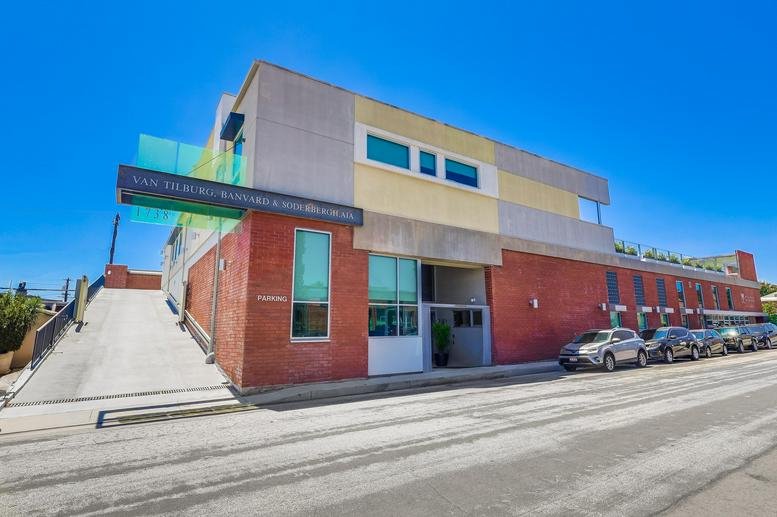 Exterior view of the modern brick and glass building at 1738 Berkeley Street, Santa Monica, California.