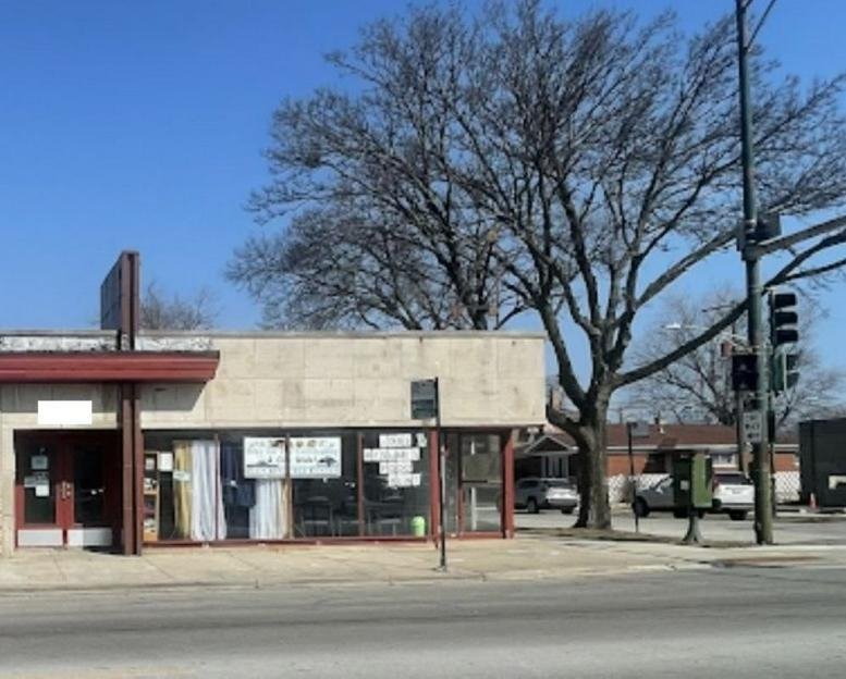 Exterior view of the single-story 1750 East 87th Street Building with storefront windows.