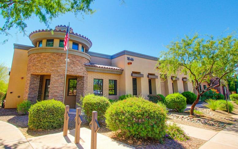 Exterior view of the stone-facade building at Innovation Corporate Center.