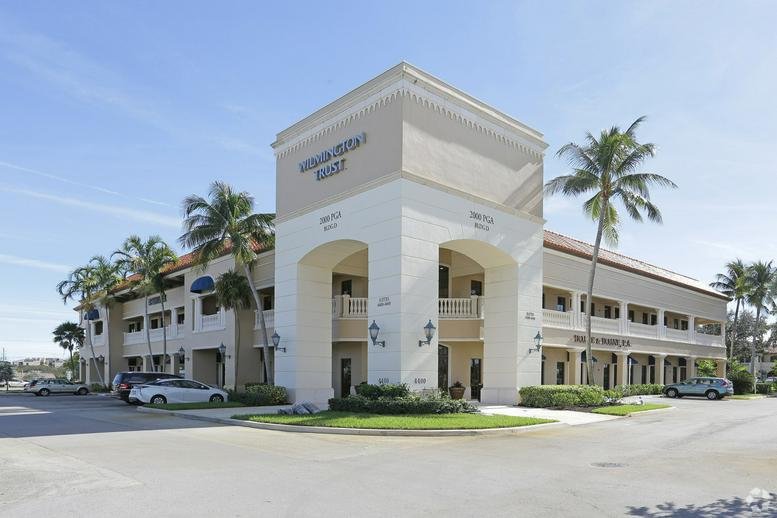 Exterior view of the Mediterranean-style building at 2000 PGA Boulevard.