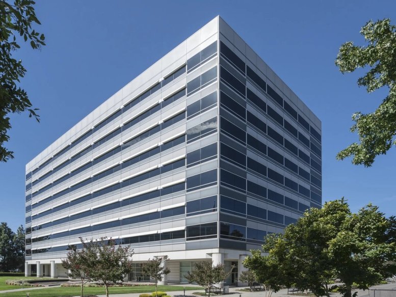 Exterior view of the multi-story glass and concrete building at 2001 Clayton Road.