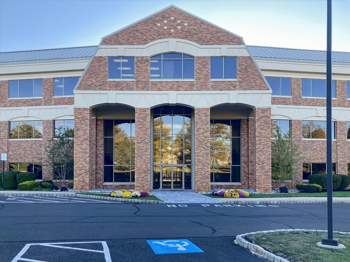 Exterior view of the brick facade building at 2003 South Easton Road, Suite 308.