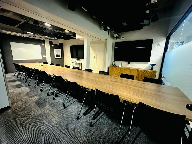 Professional meeting room at 209, 10th Avenue South, Suite 560 featuring a long wooden table.