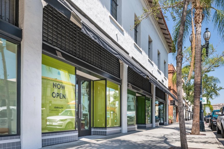 Exterior view of the white facade and storefront entrance at 21 Miller Alley, 2nd Floor, Old Pasadena.