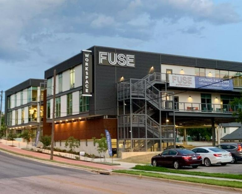 Exterior view of the modern black and wood facade at 2105 East Martin Luther King Junior Boulevard.