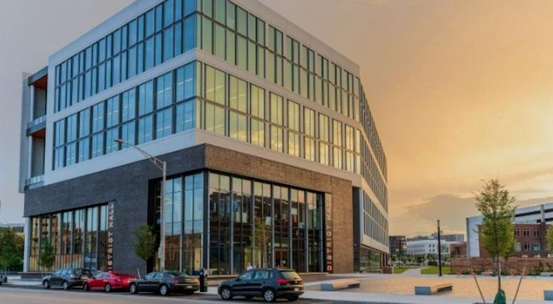 Exterior view of the modern glass-facade building at 225 Dyer Street.