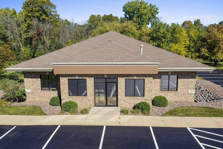 Exterior view of the professional brick-facade building at 2325 Verlin Rd.