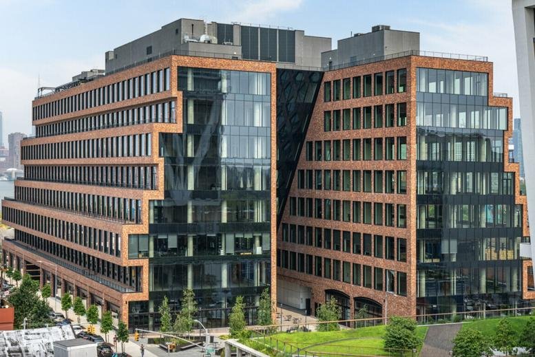 Exterior view of the tiered brick and glass office building at 25 Kent Avenue, 25 Kent, New York City.