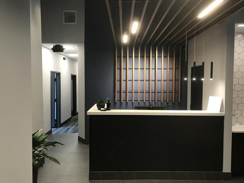 Modern reception desk at 25 Pompton Avenue, Suite 101, Montclair, New Jersey.
