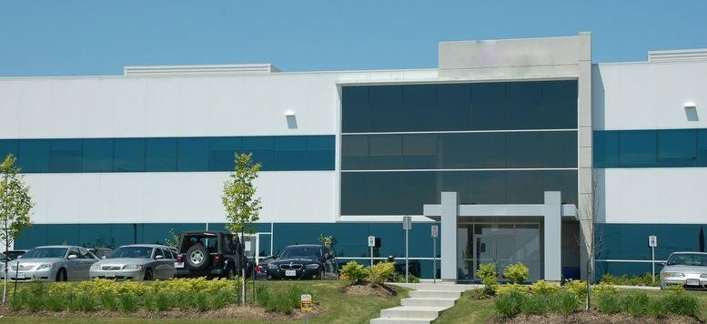 Exterior view of the office building at 30 Via Renzo Drive.